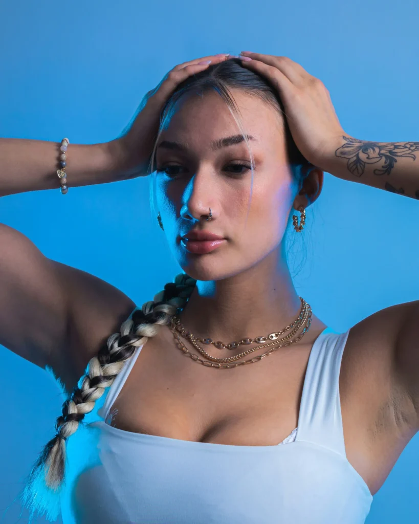 Portrait of a woman highlighting radiant melanin skin tone natural hair texture and confident expression representing African beauty