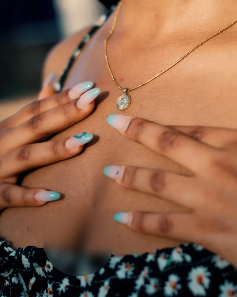 Highlights how cultural textiles influence beauty representation