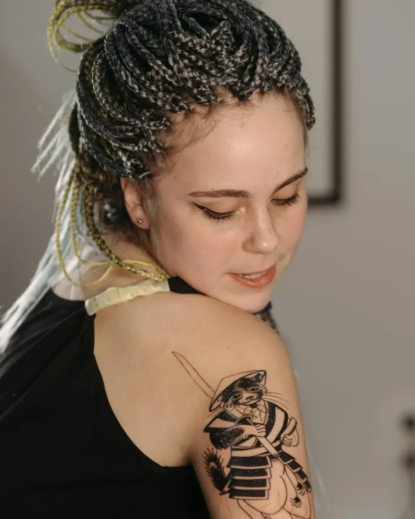 woman with infinity symbol tattoo on wrist