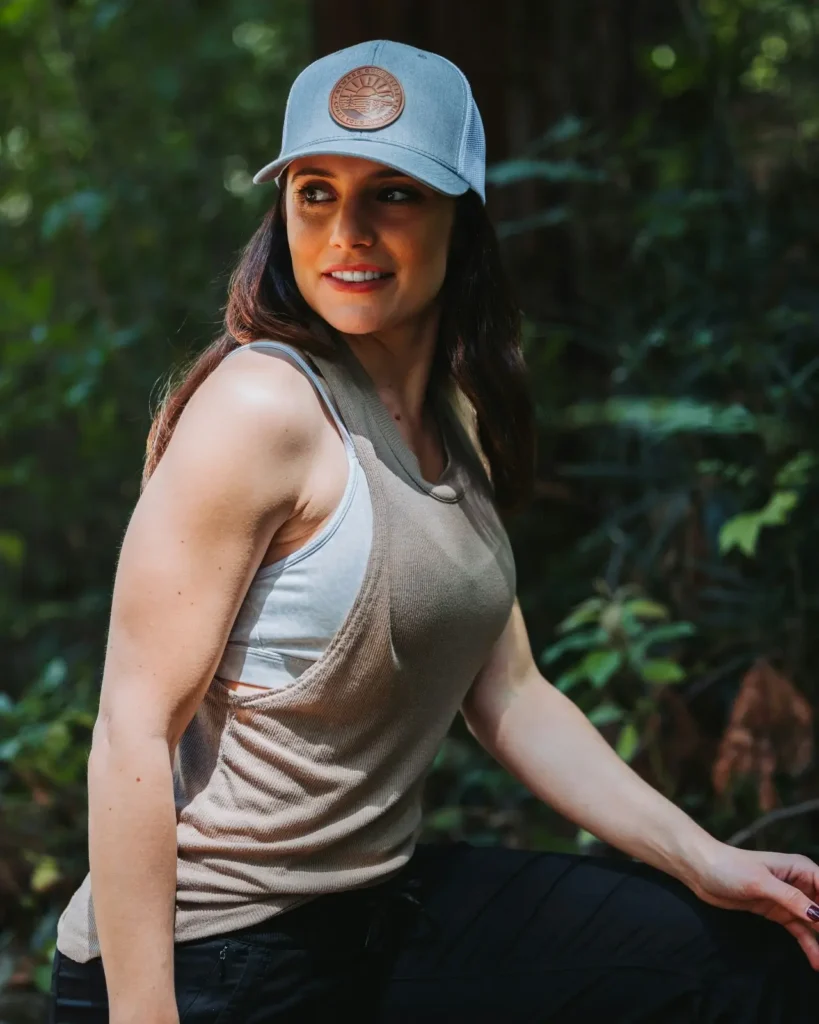 athletic woman doing functional bodyweight training outdoors