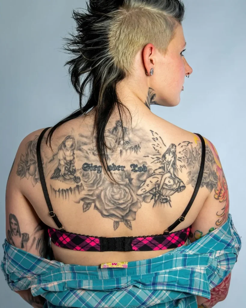 woman with warrior inspired tattoo design