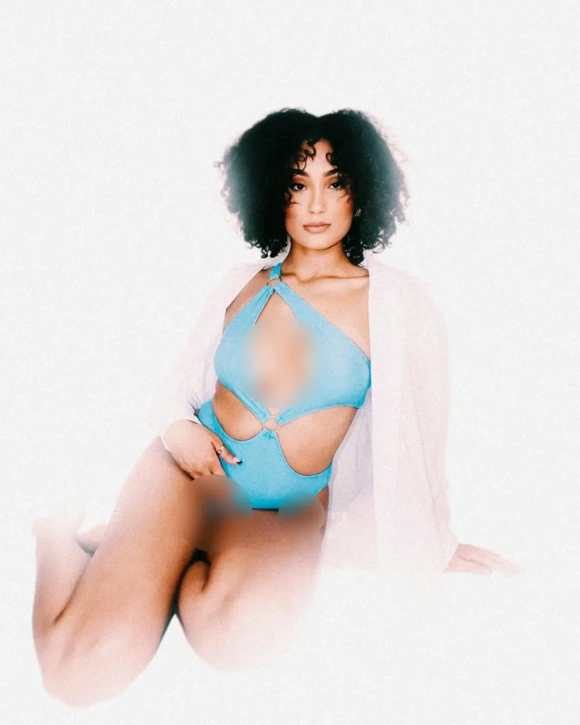 Dominican woman with natural curls in tropical setting