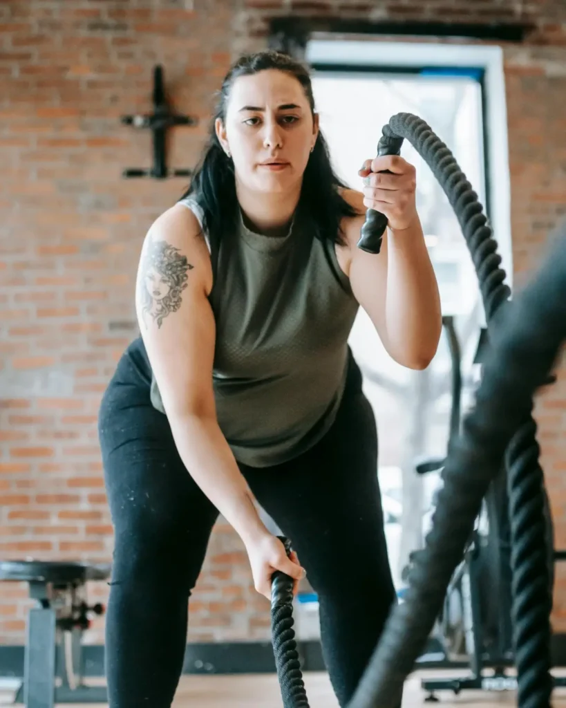 fitness woman relaxing after gym workout