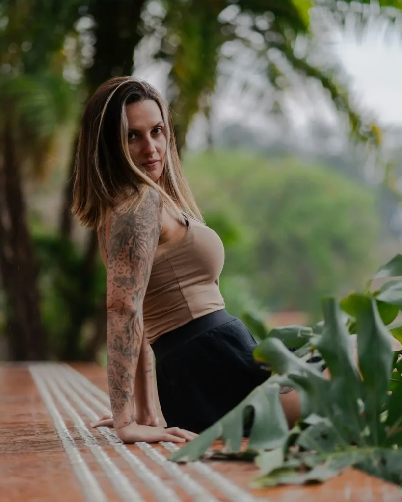 woman with nature tattoo on upper arm