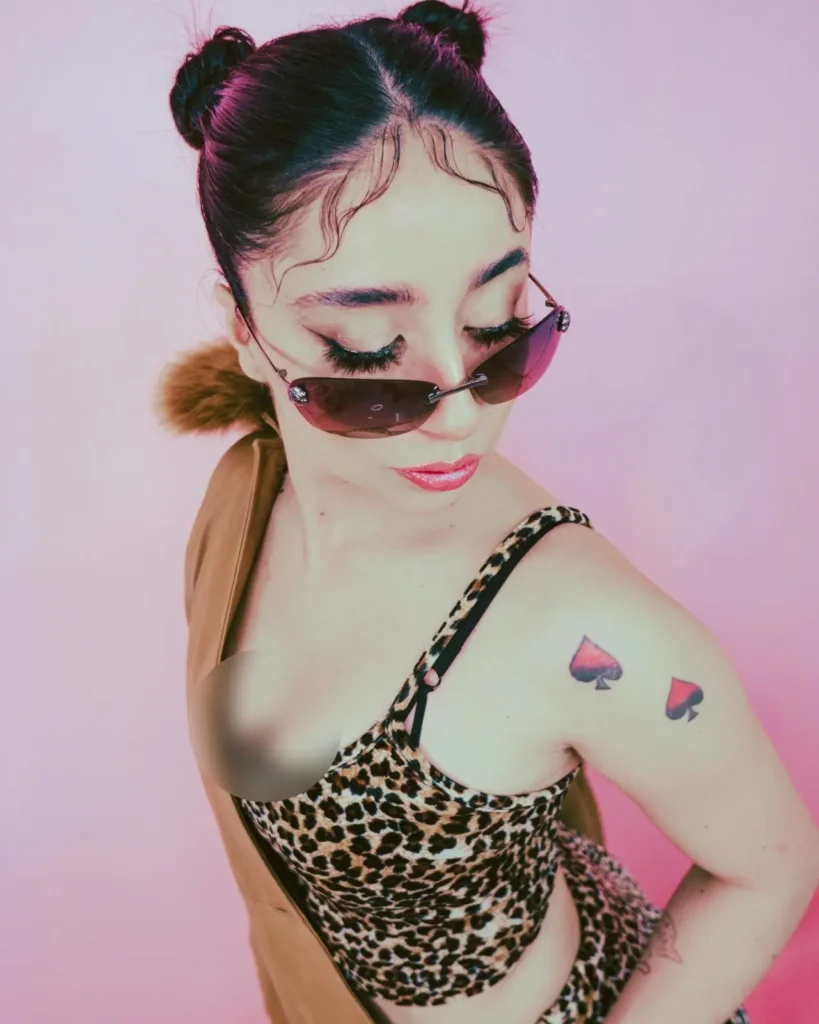 woman with inspirational script tattoo on wrist