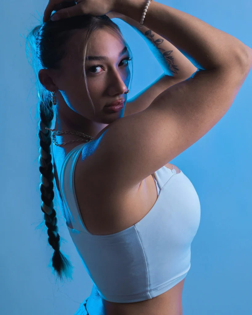 A woman wearing traditional Indigenous accessories representing cultural heritage and unique beauty